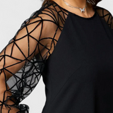 Bellezza Vestido Negro con Mangas de Malla Colección Premium