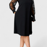 Bellezza Vestido Negro con Mangas de Malla Colección Premium